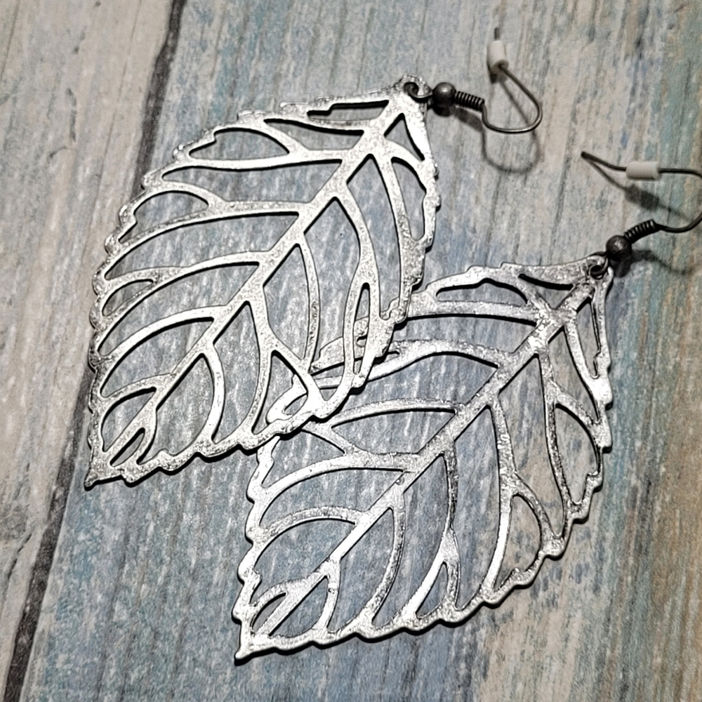 Cut out Leaf Drop Earrings. - Picture 5 of 5